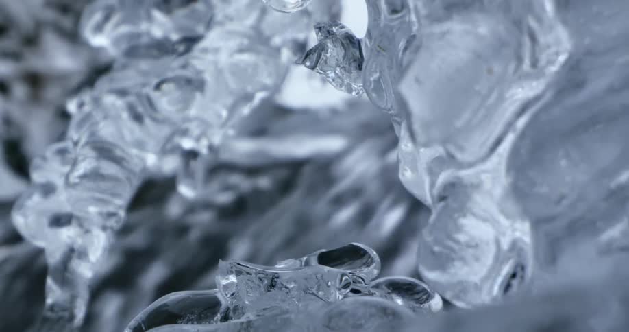 Icicles frame a flowing river