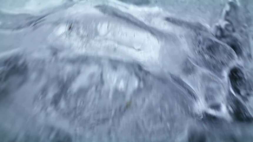 A view of water running over ice