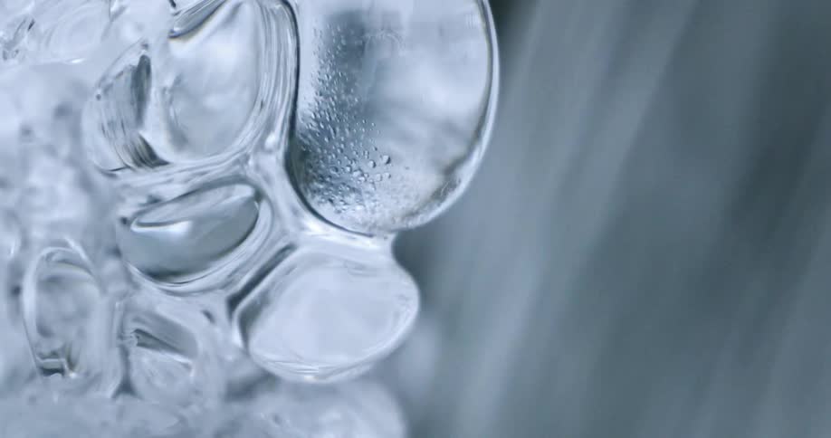 Water running down near some melting ice