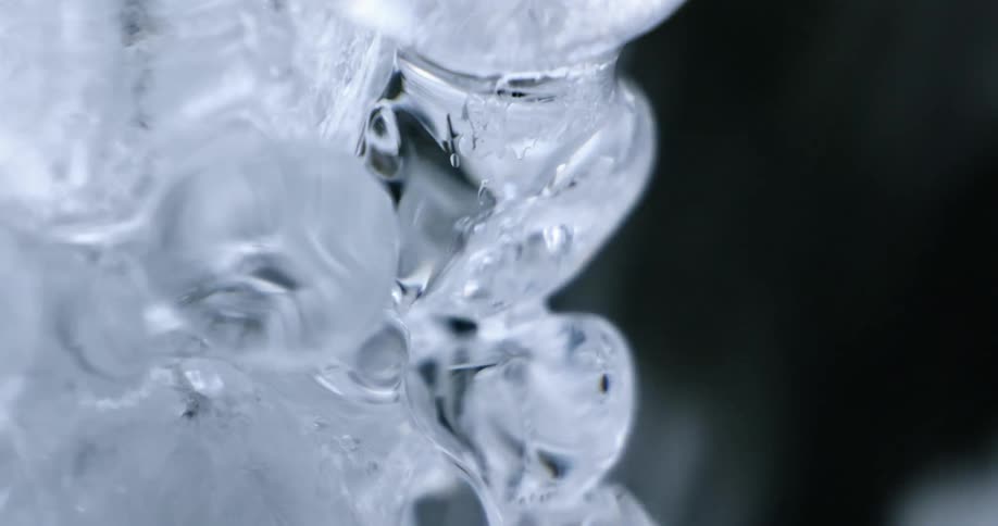 A waterfall with ice melting