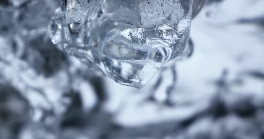 Droplets off water melting off an icicle