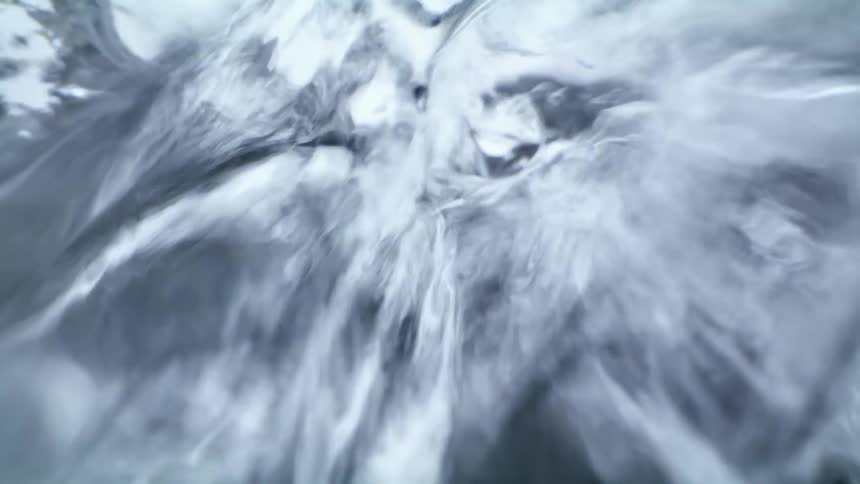 Close up of water rushing in a water fall