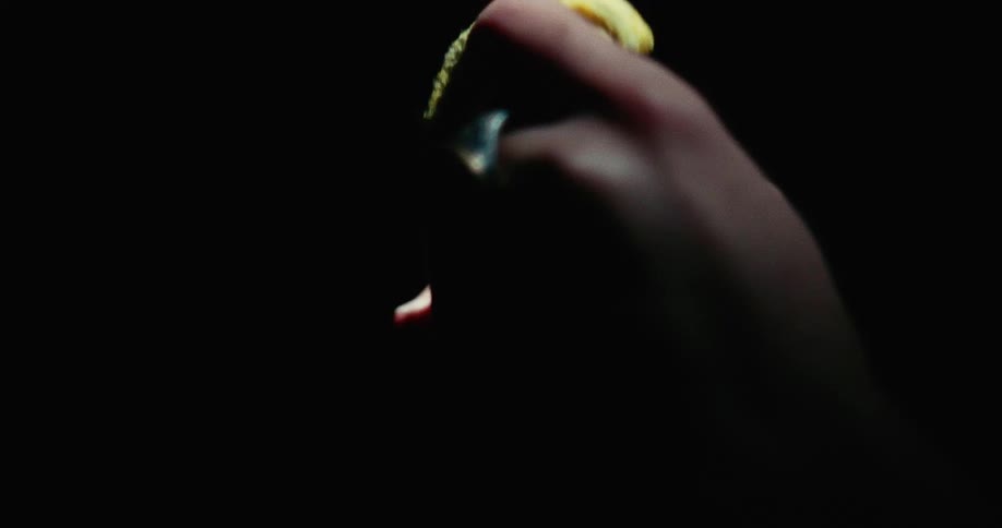 A view of someone washing their hands with a towel up close