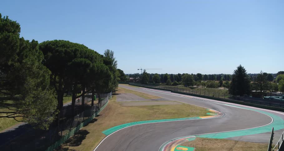 The race track is empty on a sunny day