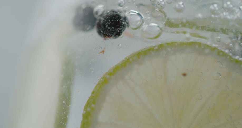 A view of fruit in a drink