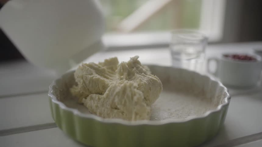 A pastry pan has some custard in it