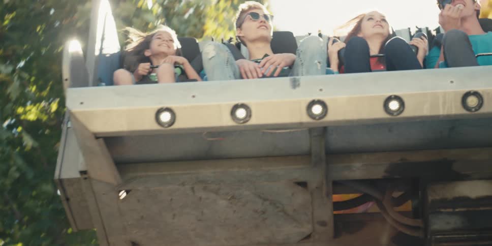 A group of people riding a ride at an amusement park