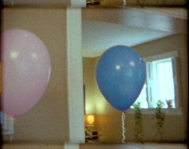 Balloons set up in a home for a celebration