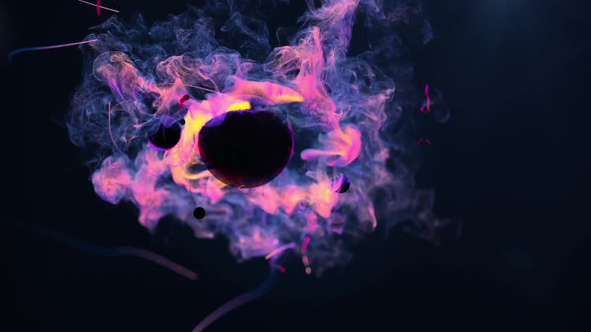 Yellow and purple colors move around black spheres and explode into colorful lines and smoke