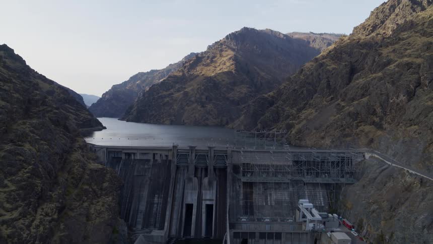Descent over a hydroelectric power dam from the upper reservoir to the river outflow below