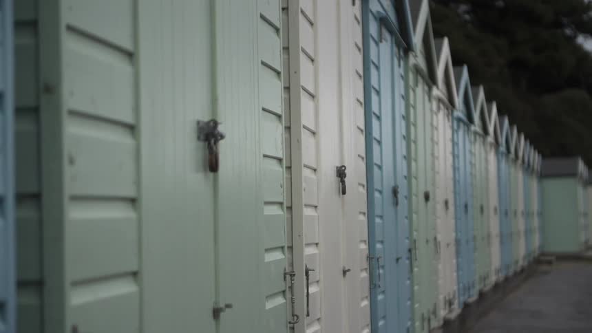 A row of storage units have locks on them