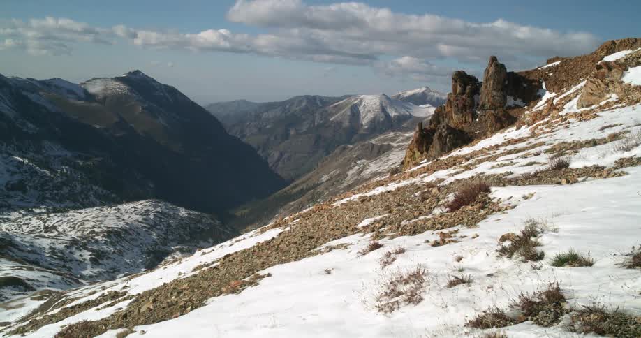 Snow covers the slope and peaks of mountains