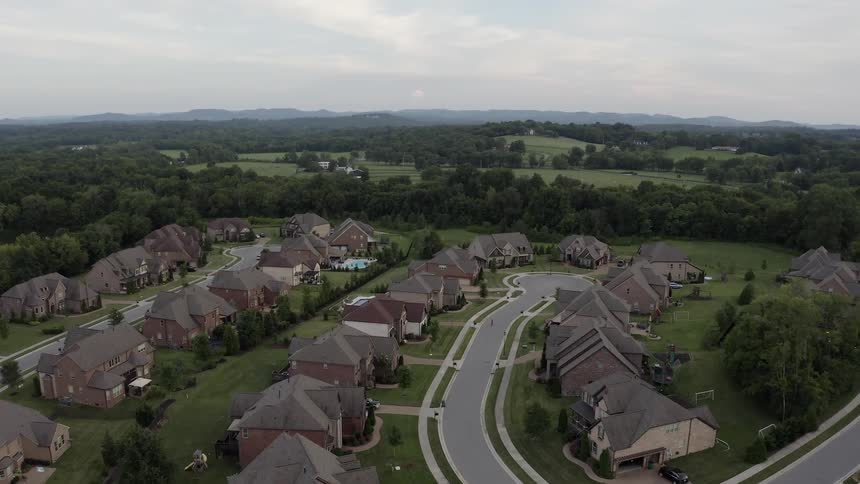 An aerial view of a subdivision in a neighborhood