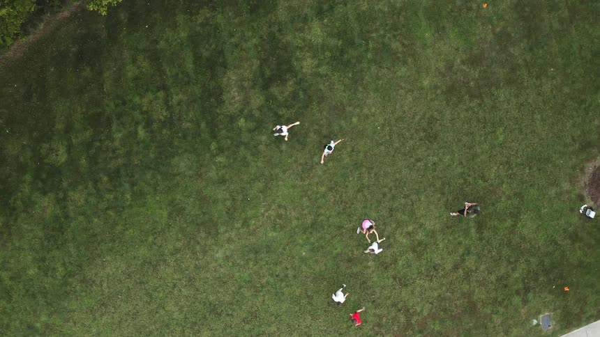 A group of kids playing in a field