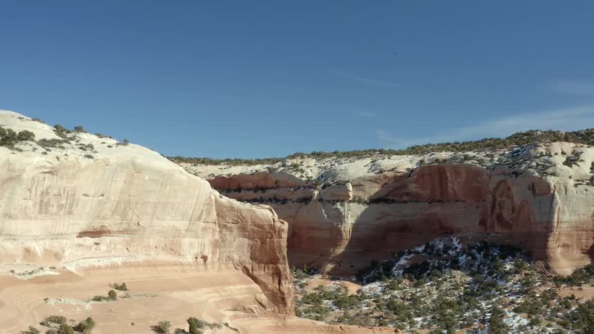 The canyon is under a clear sky