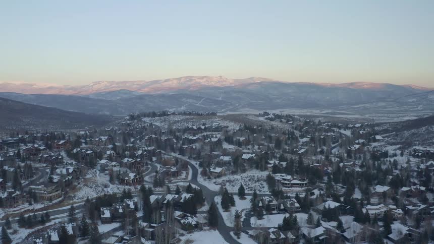 The mountains are past the town