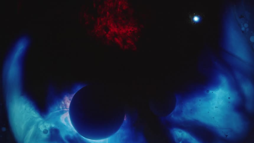 Red black and blue colors that look like water and oil