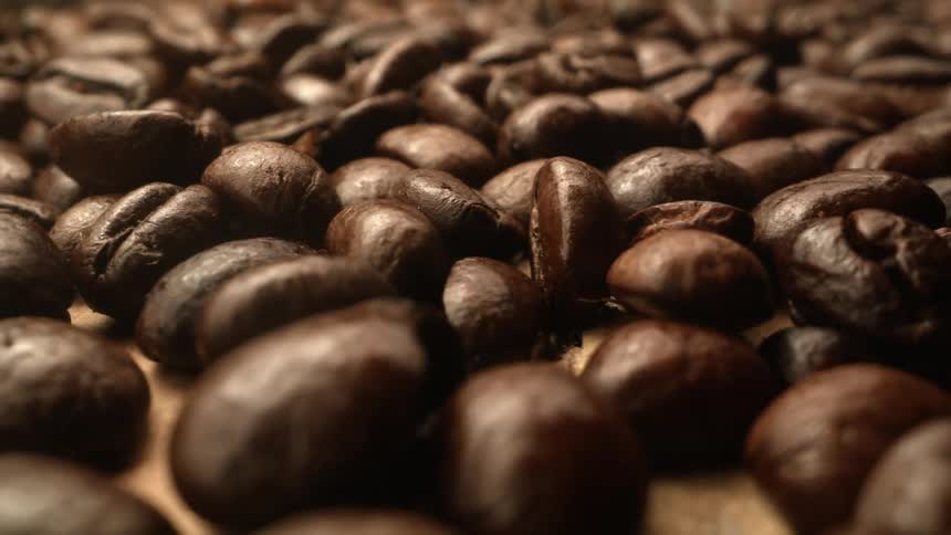 Coffee beans are displayed on a table