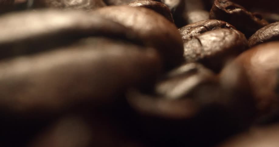 Extreme close up of brown roated coffee beans