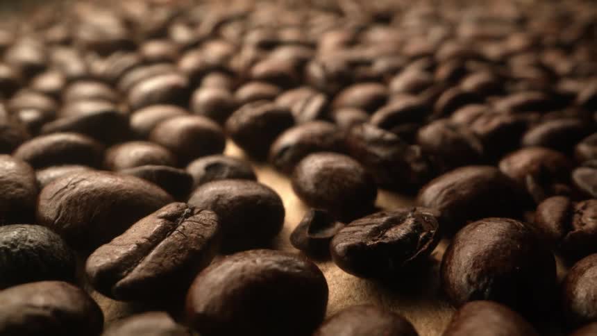 Coffee beans are displayed on a table