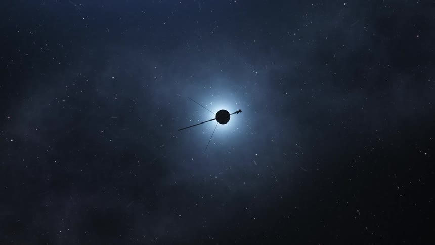 Voyager probe flying in space towards a bright star