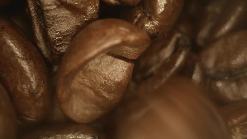 Coffee beans falling and piling up