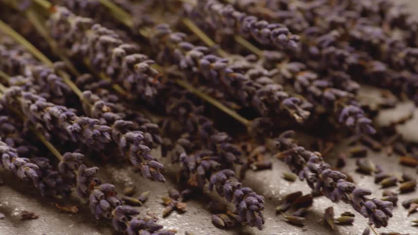Bunch of whole grains on the stem resting on a table