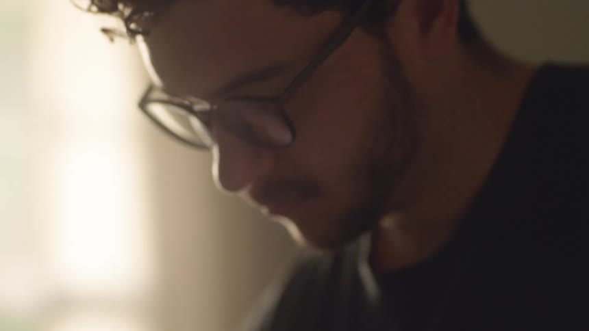 A close up of a man working on something