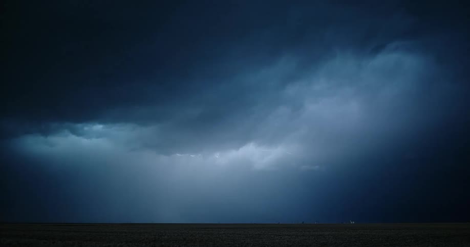 Lightning flashing across the night sky