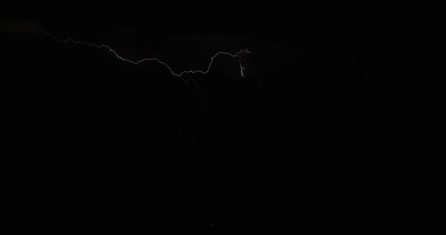 Lightning is flashing outdoors at night