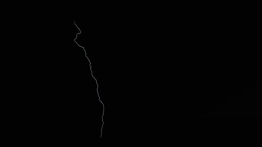 Lightning bolts flash and branch out in a dark sky