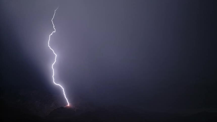 A landscape with a storm with lightning with the sky and clouds in the background