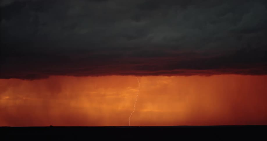 A storm with lightning with a landscape the sky and clouds in the background