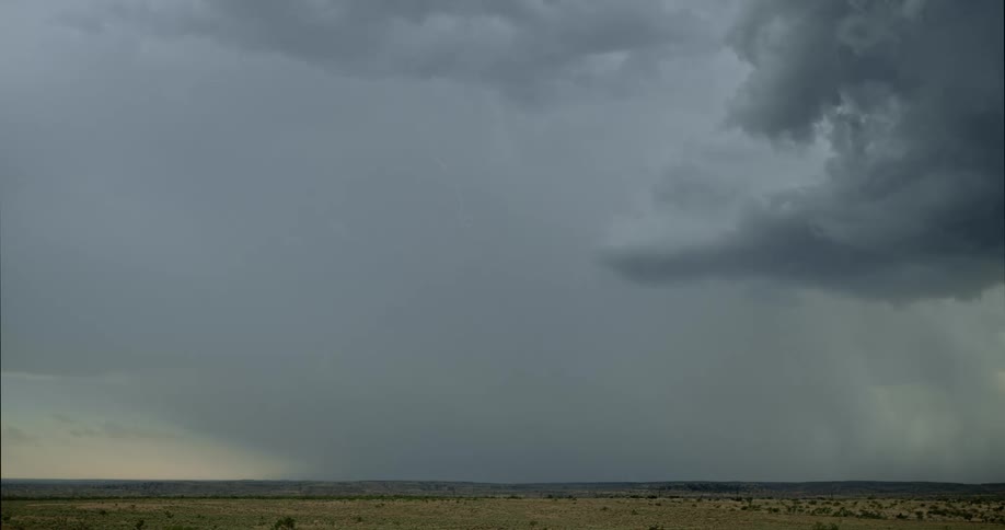 The storm is moving over the field