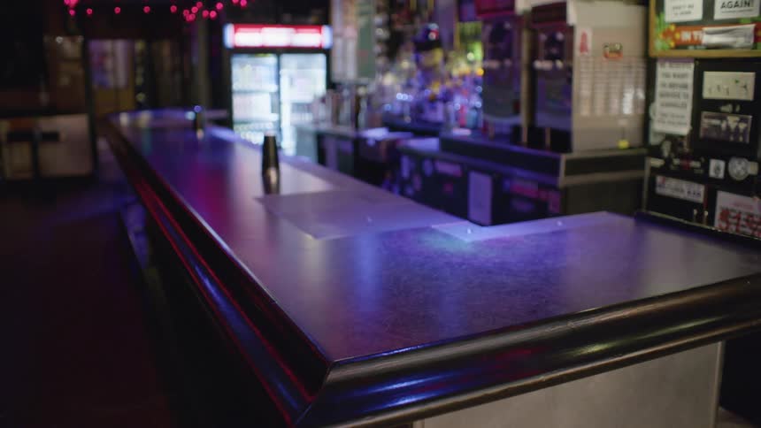 The counter top of a bar in a pub