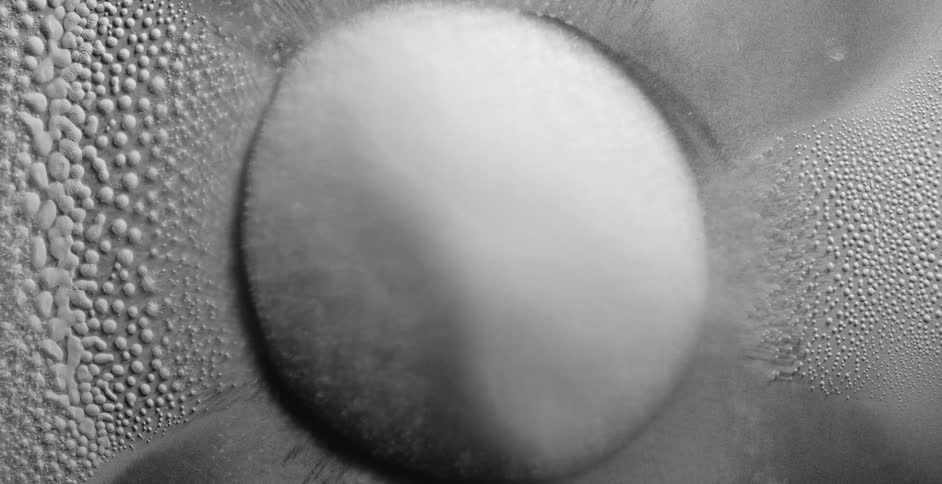 Powder shifting and pouring through a funnel settles in a pattern