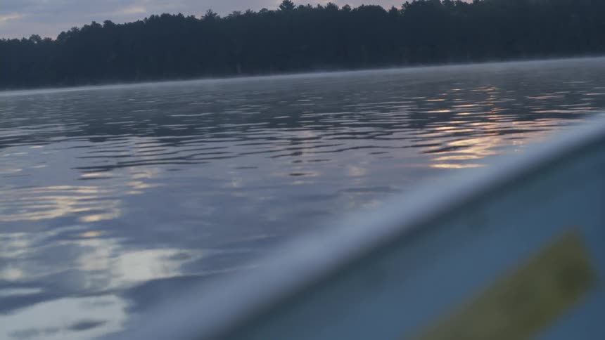 View of water as a boat travels across a lake