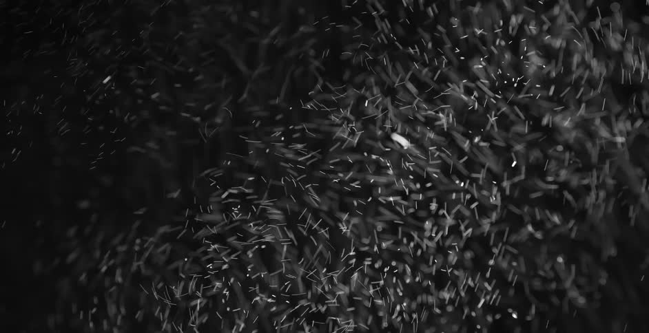 White and black colors that look like snow and the black night sky