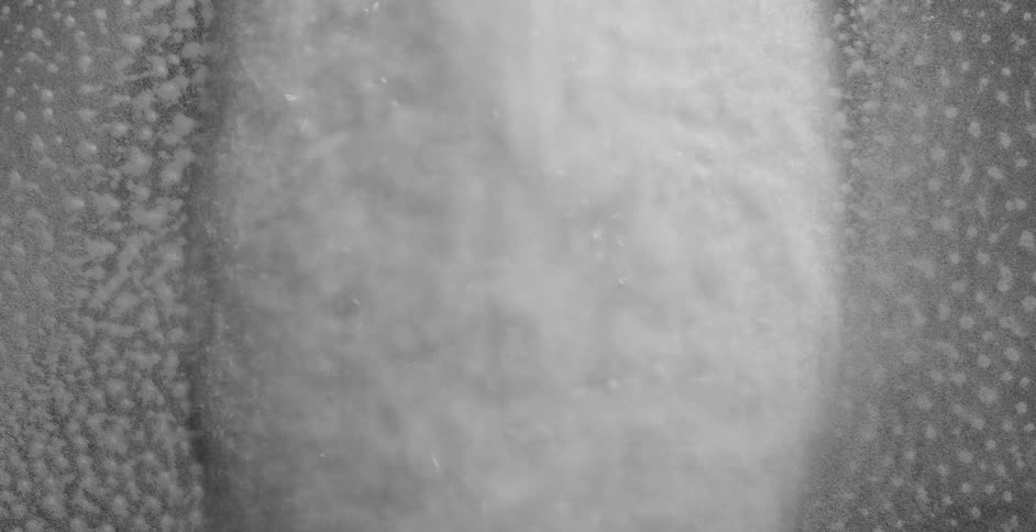 Solid white mass trembles and expands as a powder