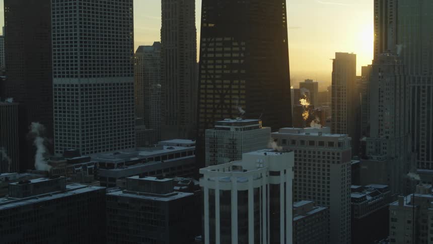 Aerial view of the skyscrapers in chicago skyline at sunset