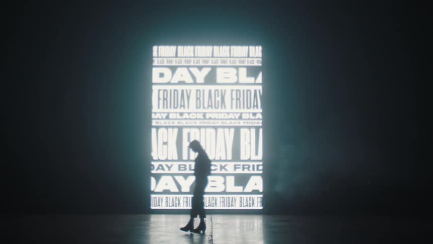 Womens silhouette places in front of sign