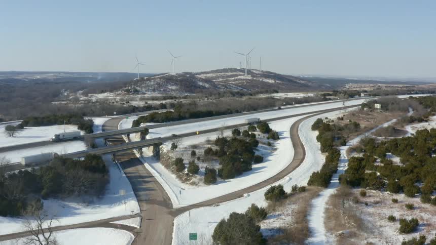 An aerial view of vehicles on a highway
