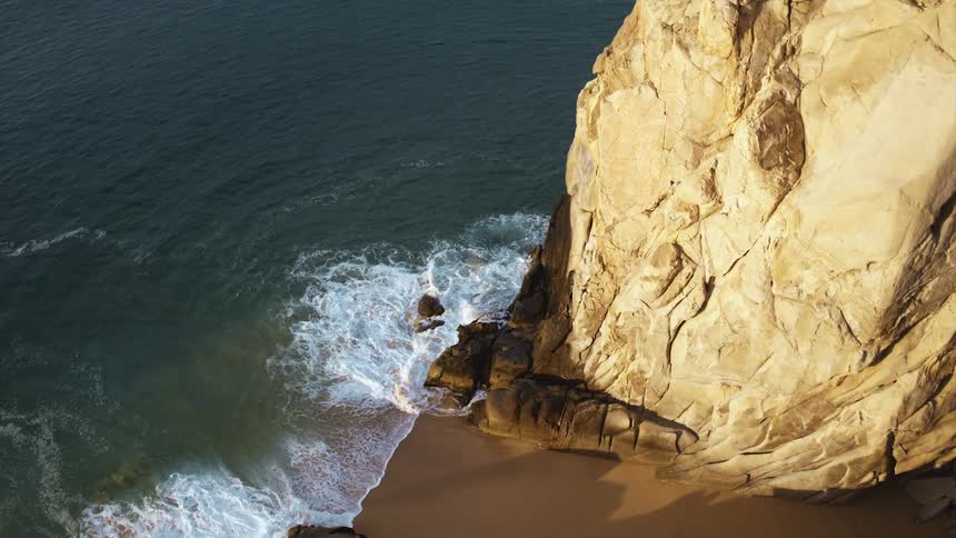 The large rocks lines the beach