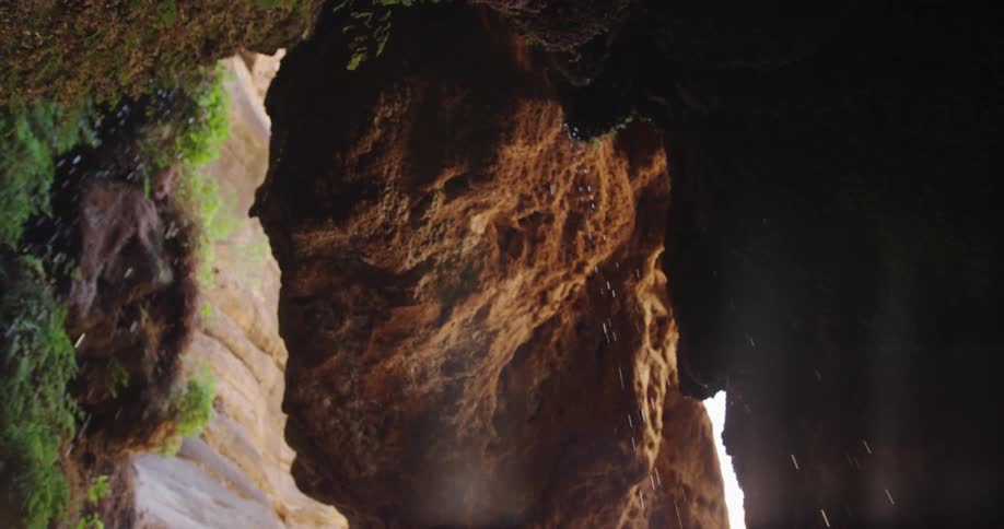 Water cascades down a cliff face near Elves Chasm deep in Grand Canyon National Park on a side hike near the Colorado River