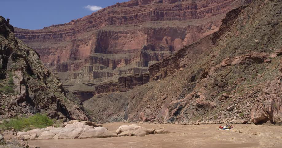Whitewater rafts flow downstream on the Colorado River in Grand Canyon National Park on a dream vacation