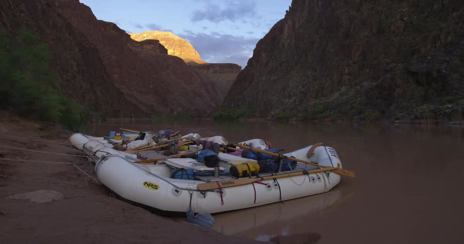 Whitewater rafts beached at camp for the evening on a multi day rafting trip through the Grand Canyon of the Colorado River in Arizona and the American Southwest
