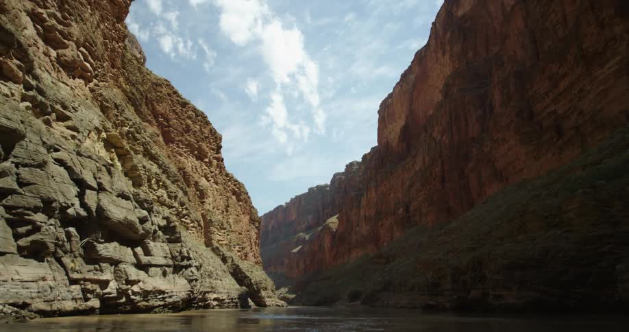 Looking upstream while rafting down the Colorado River in Grand Canyon National Park in the American Southwest as water flows towards Phoenix and California