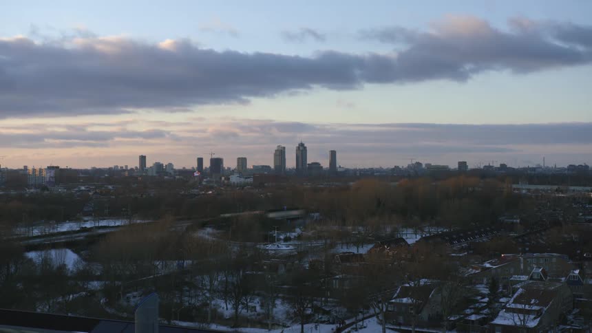 Aerial view of the neighborhood near the citys downtown skyline at sunset