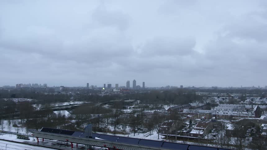Aerial view of a neighborhood near the citys downtown skyline