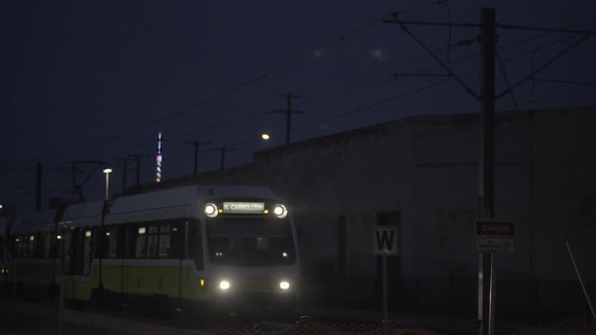 A commuter train at night